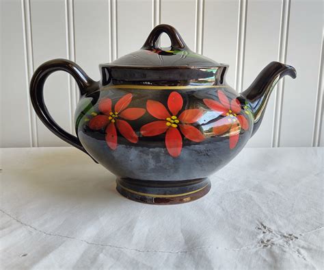 It is in wonderful condition No. . Royal canadian art pottery teapot